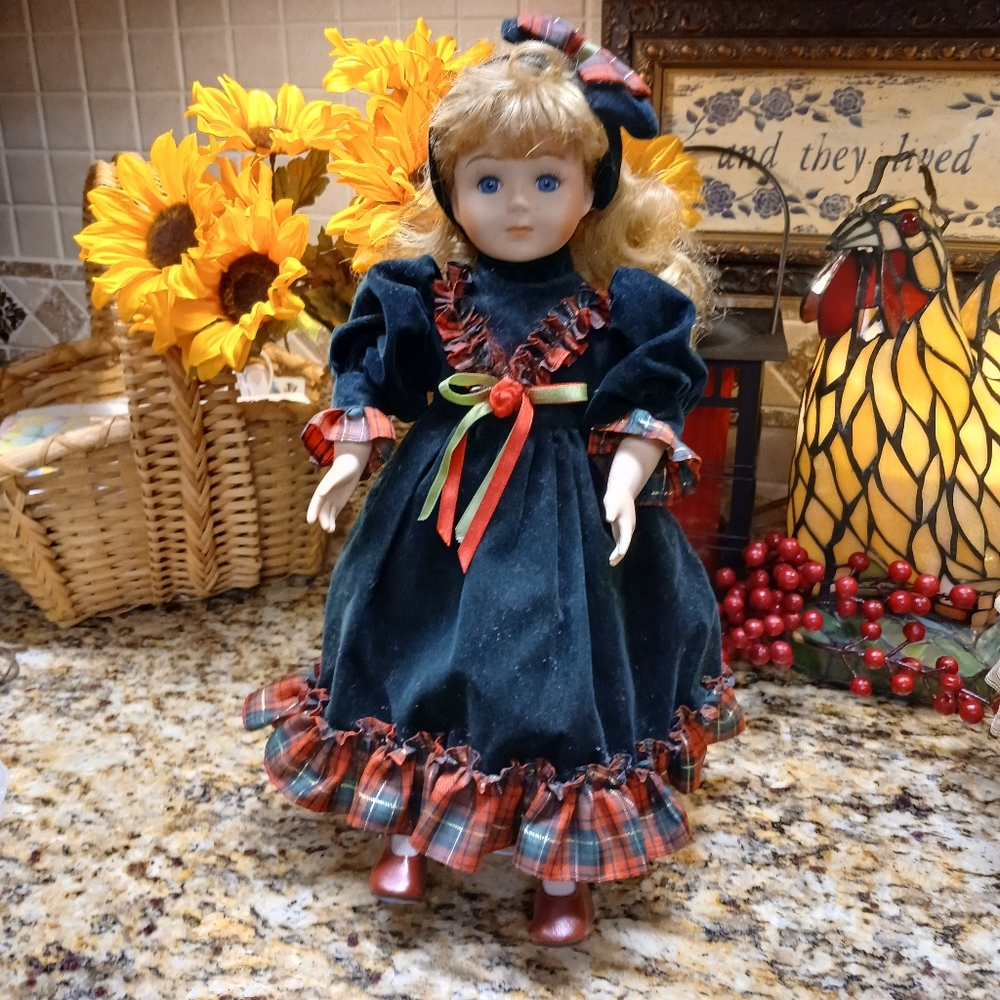 Antique Porclean Doll with Blue Dress and Blonde Curly Hair
